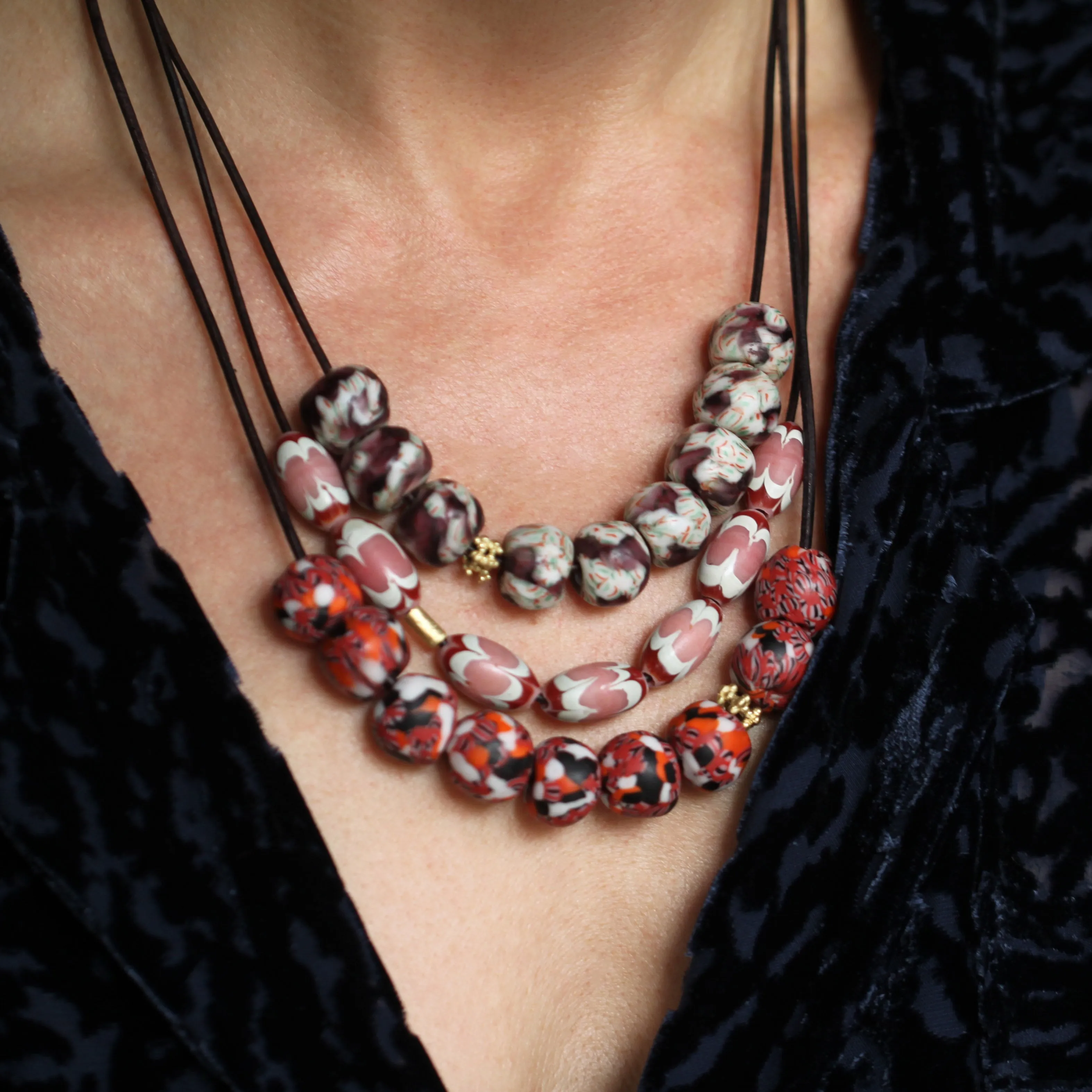 A Pink, Red,   White Swirl Bead Necklace