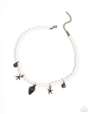 Beachcomber Beauty - Brass - Seashell and Starfish Charm White Pearl Paparazzi Short Necklace