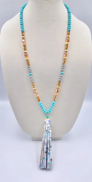 Beautiful Turquoise & gold crystal necklace with floral tassel