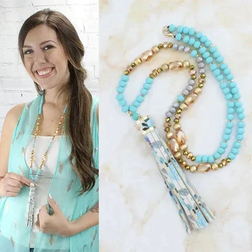 Beautiful Turquoise & gold crystal necklace with floral tassel
