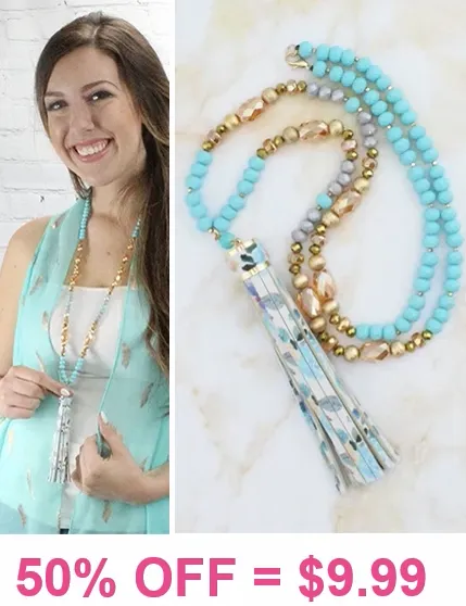 Beautiful Turquoise & gold crystal necklace with floral tassel