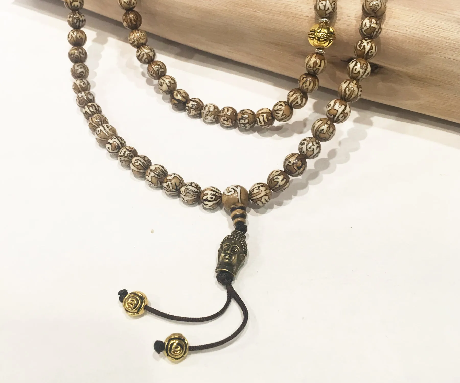 COMPASSION MALA CONCH SHELL