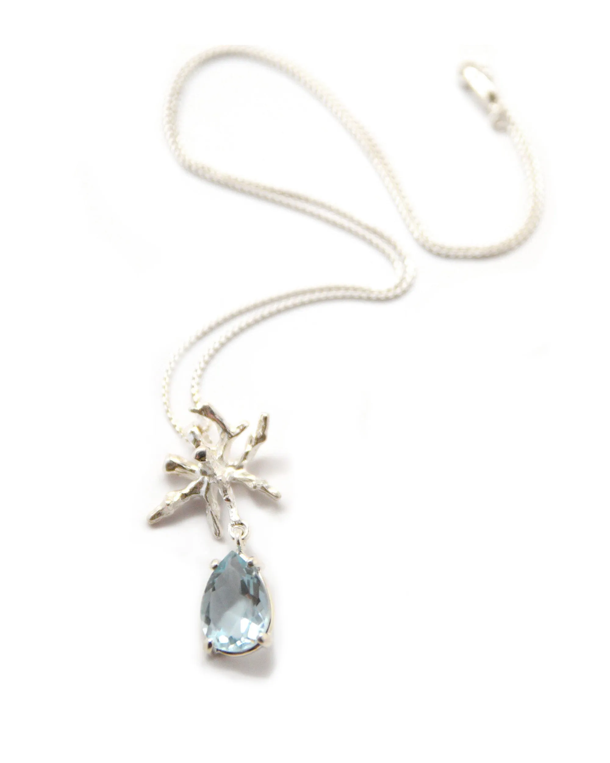 Coral Teardrop Pendant in Blue Topaz