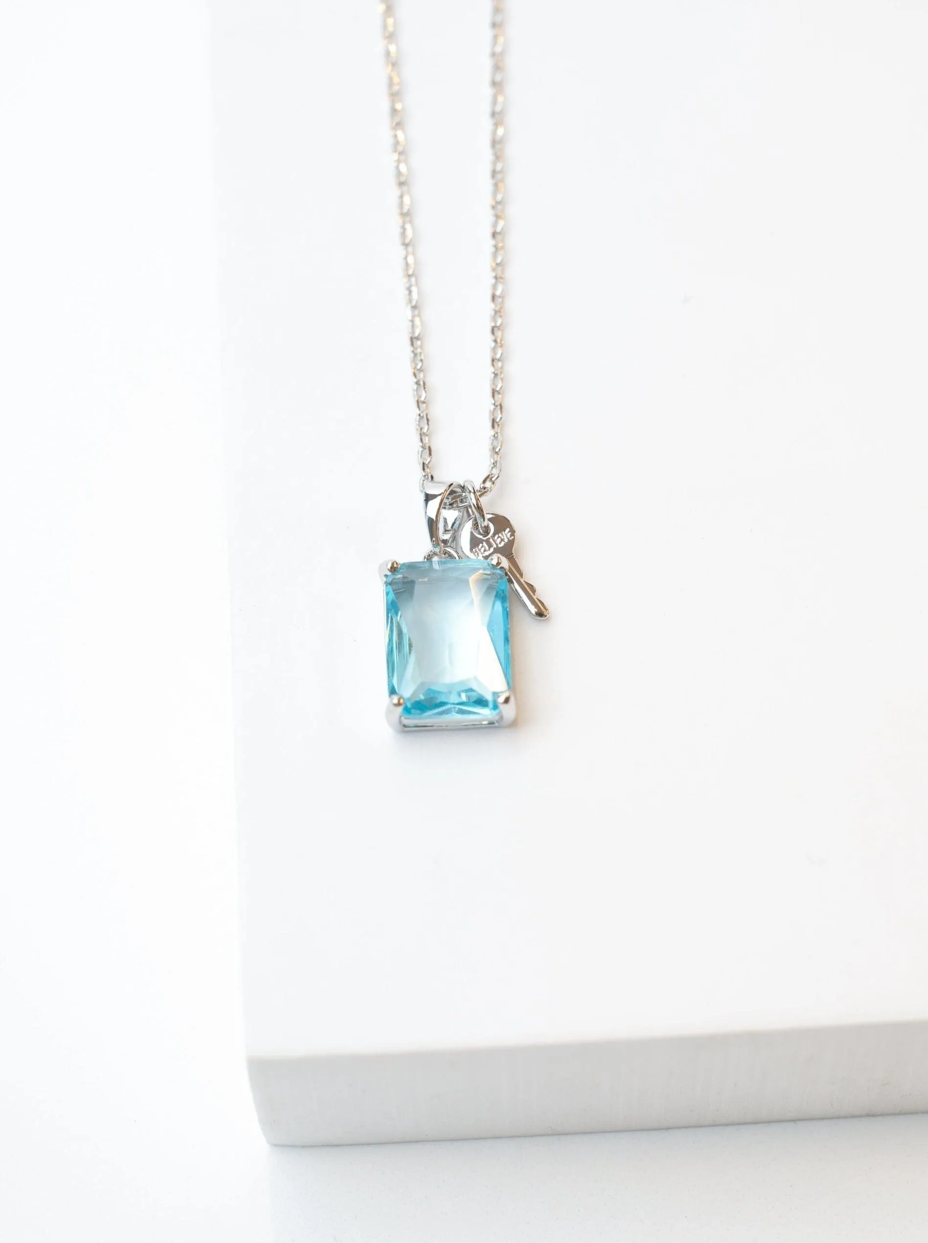 Emerald Cut Gemstone and Mini Key Necklace in Silver