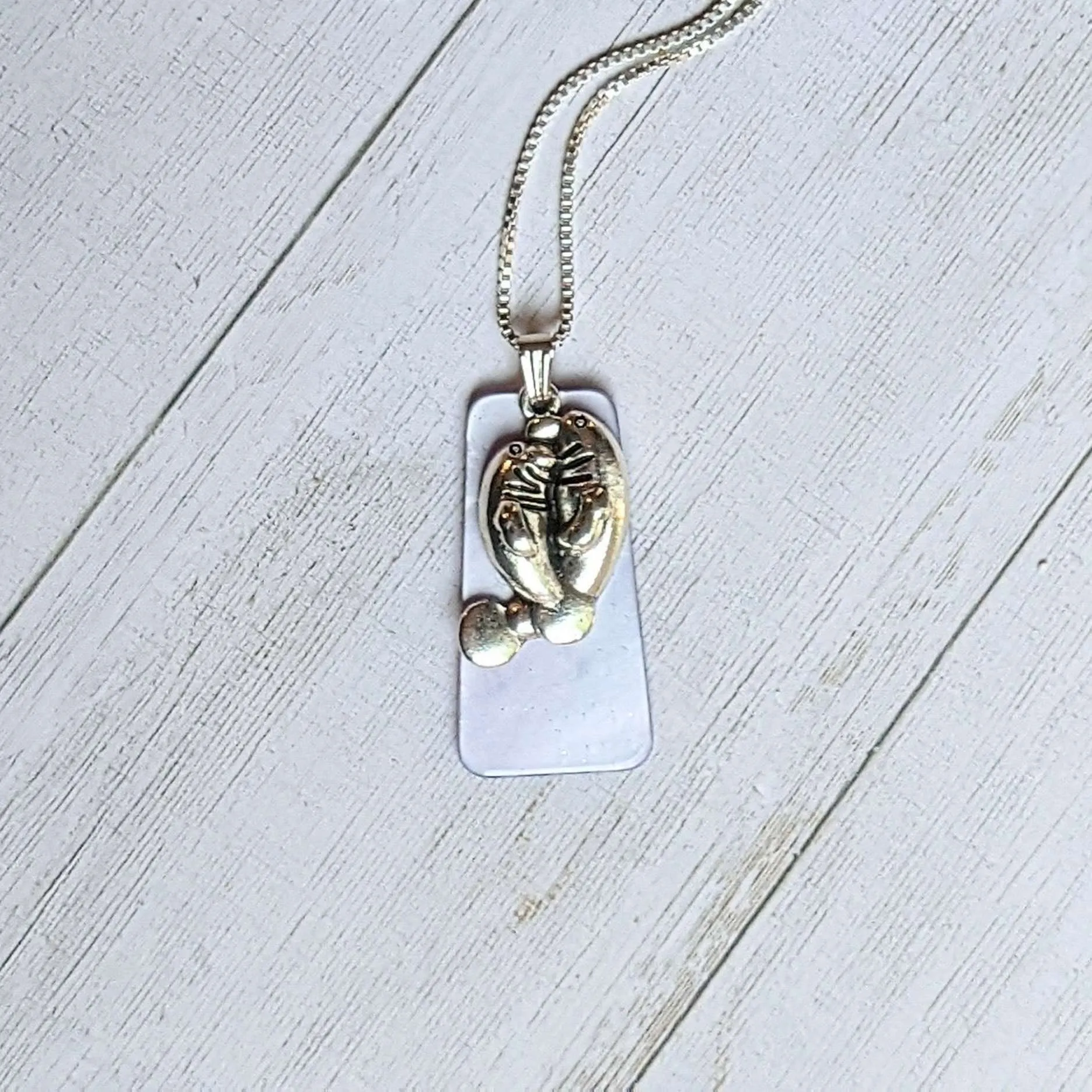 Manatee with Calf Tag necklace, 30 inch