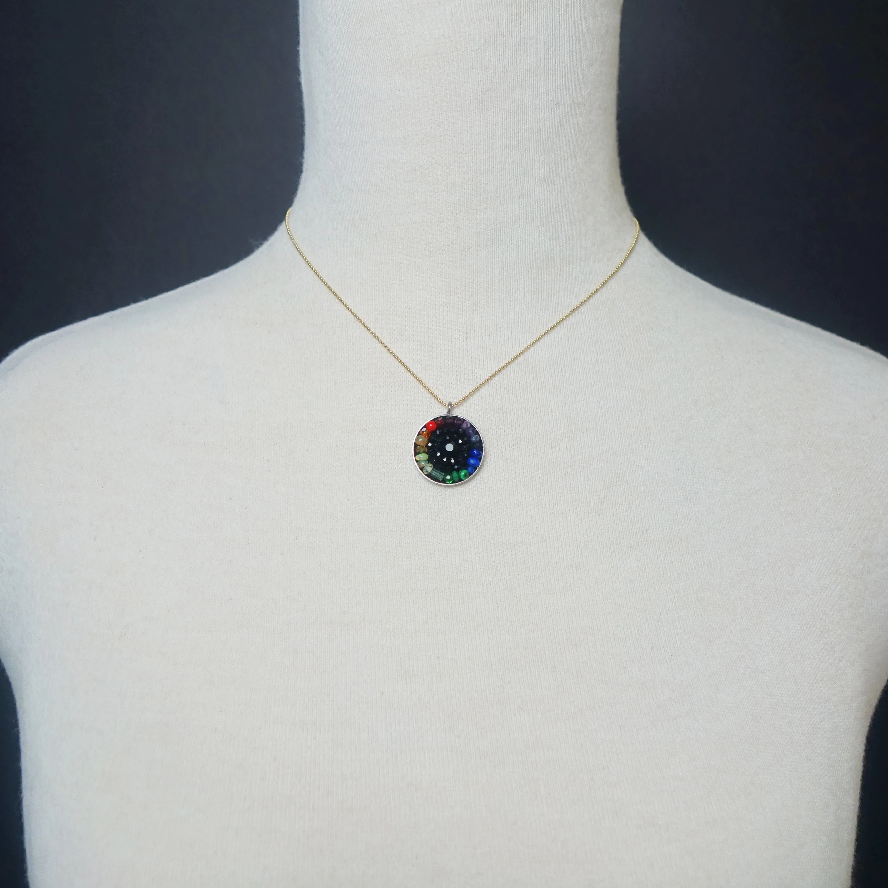 Sapphire, tourmaline, opal: mosaic rainbow pendant on gold