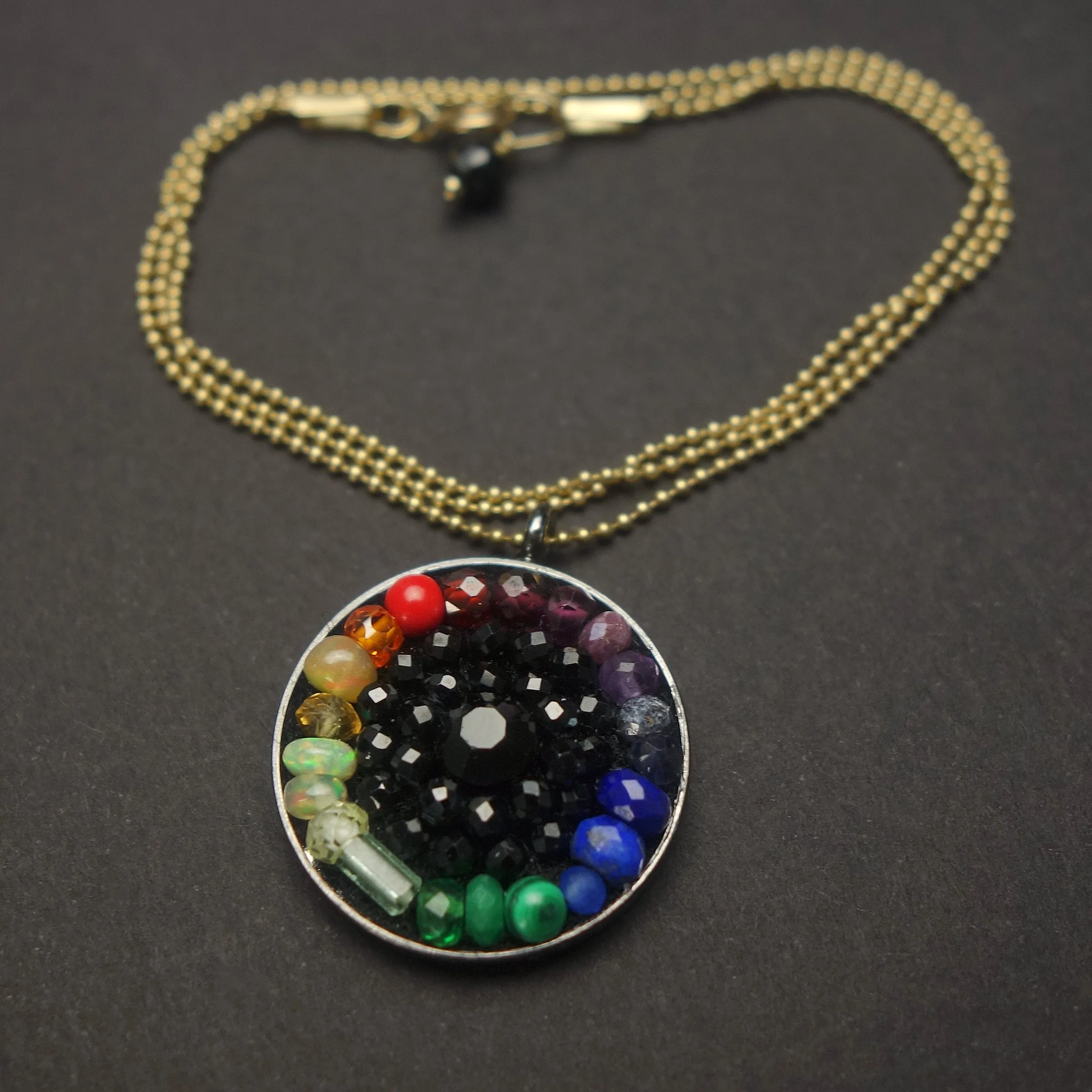 Sapphire, tourmaline, opal: mosaic rainbow pendant on gold