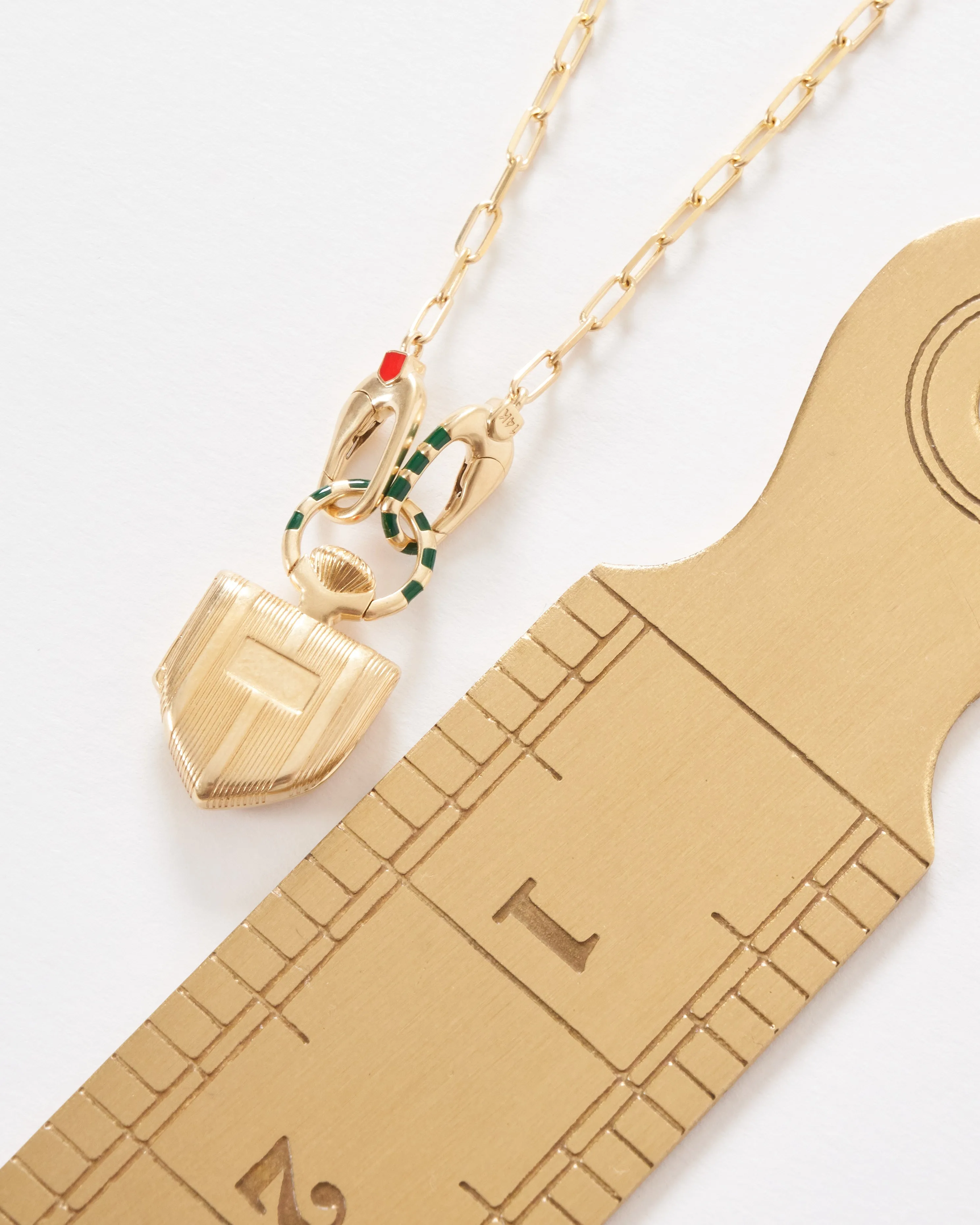 the curiouser vault w/ 14k paperclip chain stripe