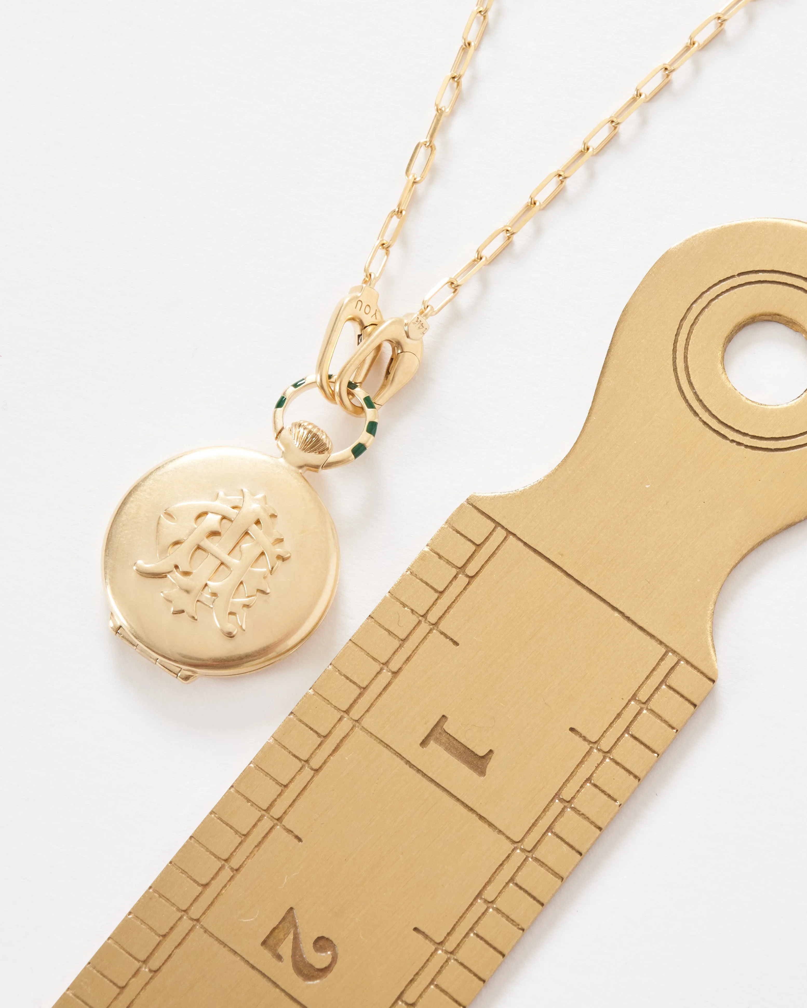 the endeavor vault w/ 14k paperclip chain