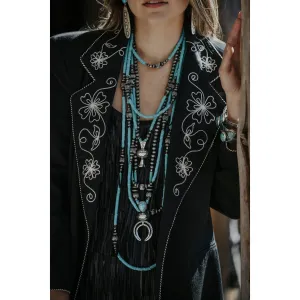 West and Co Turquoise Necklace with Stamped Blossom Pendant